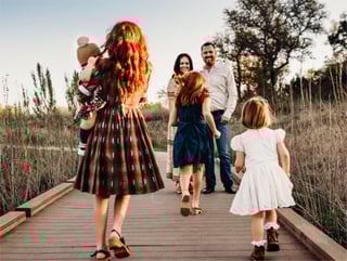 Family on a pier in tall grass