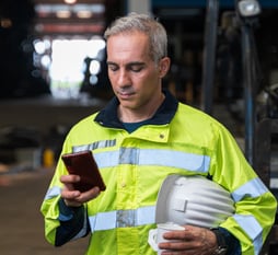 man reading on his phone